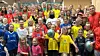 400 spente barn og unge fylte lokalet til Eviny for den årlige draktutdelingen. Stemningen var høy da små og store møtte fotballhelter fra Brann og fikk med seg nye treningsbager fylt med splitter nytt treningstøy. Foto: Eviny