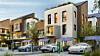 Modern apartment buildings and fast electric car charging statio