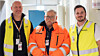 På bildet ser vi Håkon Vinge, Bravida, prosjektdirektør Kjell Magne Nesset i Avinor og HMS-sjef i Bravida Norge, Kristofer Paulsson.