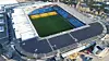 Vertikale solcellepaneler øker bærekraften på Norges Nasjonalstadion, og viser en innovativ tilnærming til integrering av fornybar energi. Foto: Over Easy Solar