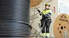 Mina, lærling i Bravida, jobber med elektroinstallasjoner på Alvim renseanlegg. Foto: Bravida